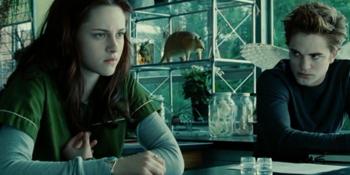 Bella Swan and Edward Cullen sit in a Lab in Twilight