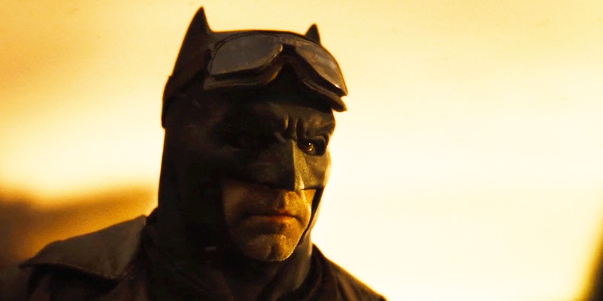 Batman looking serious as the sun sets in Zack Snyder's Justice League.