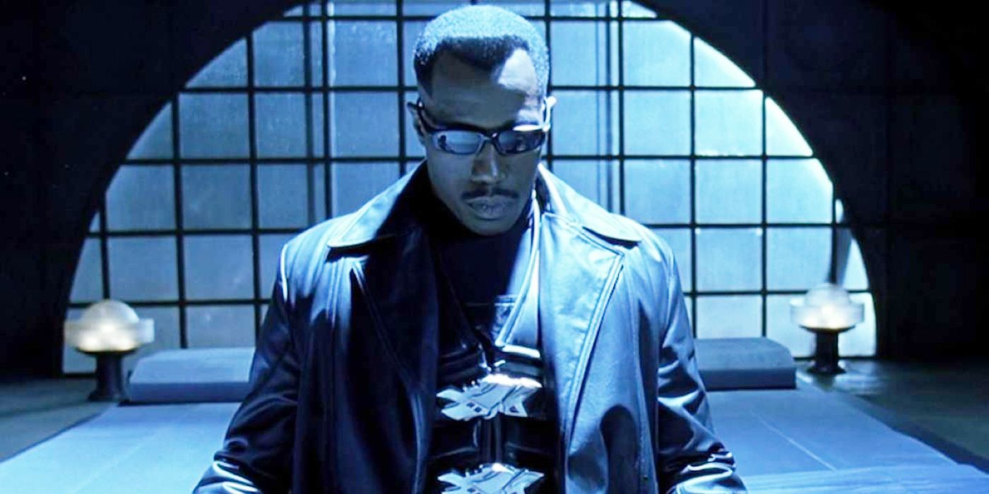 Blade standing alone in an empty room in Blade (1998).