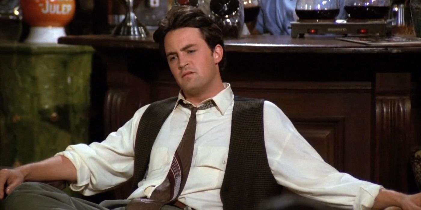 Chandler Bing sitting at a sofa in Central Perk in Friends