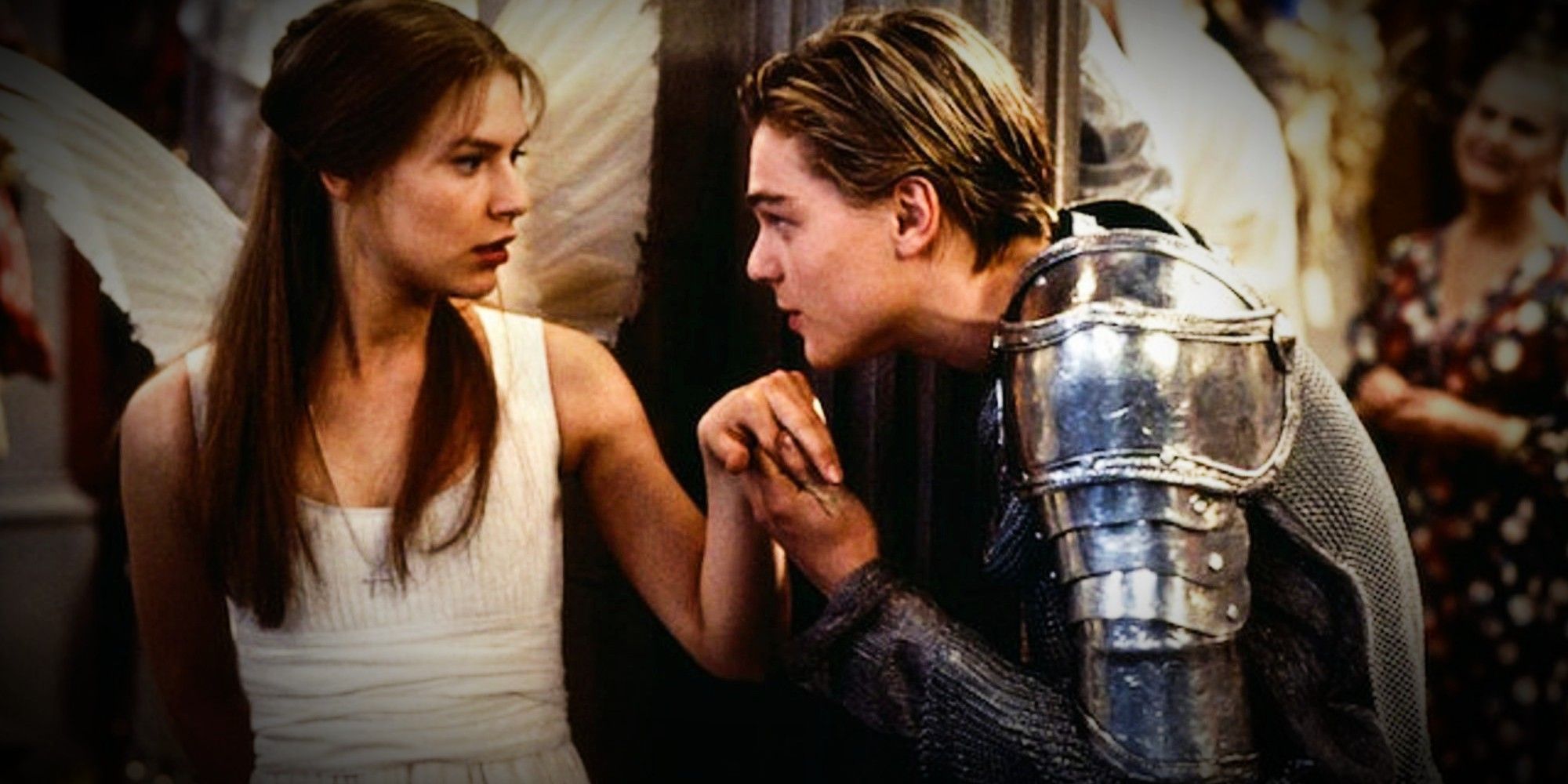 Romeo kissing Juliet's hand in Romeo + Juliet