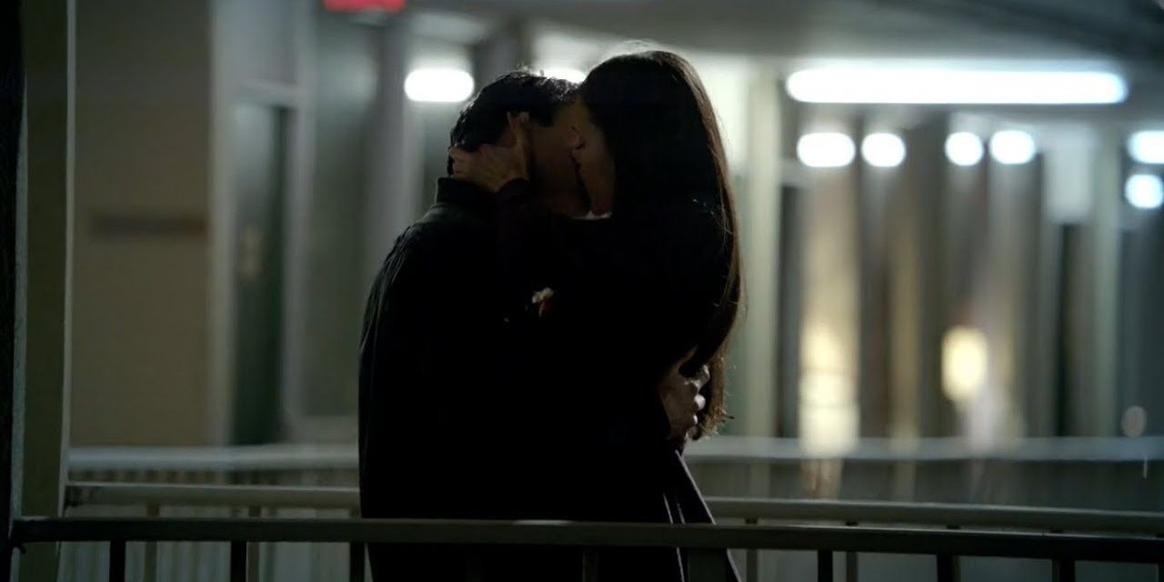 Damon and Elena make out by the stairs in The Vampire Diaries 