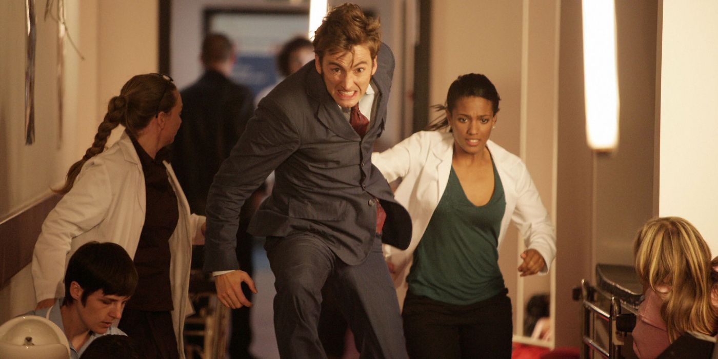 The Doctor and Martha run through a hospital hallway in Doctor Who.