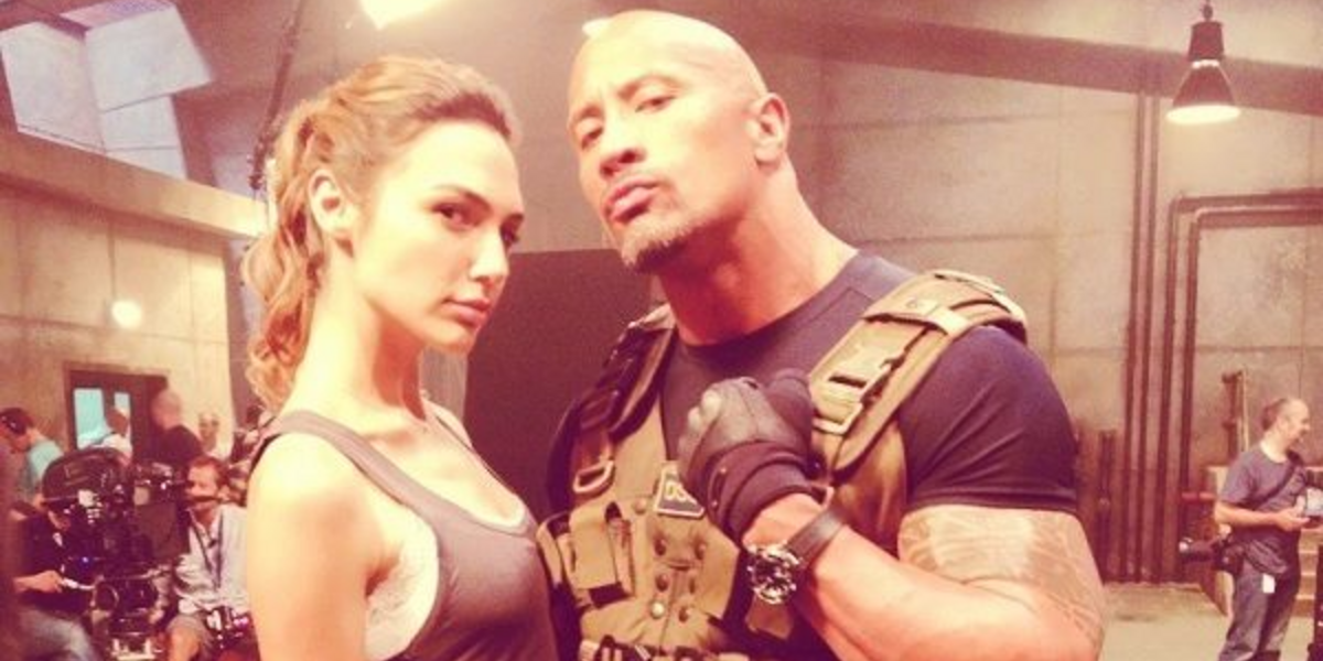 Dwayne Johnson and Gal Gadot posing while filming Fast and Furious