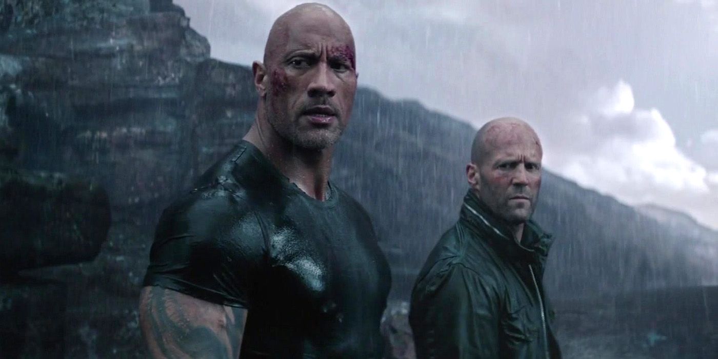 A wounded Hobbs and Shaw looking in the same direction