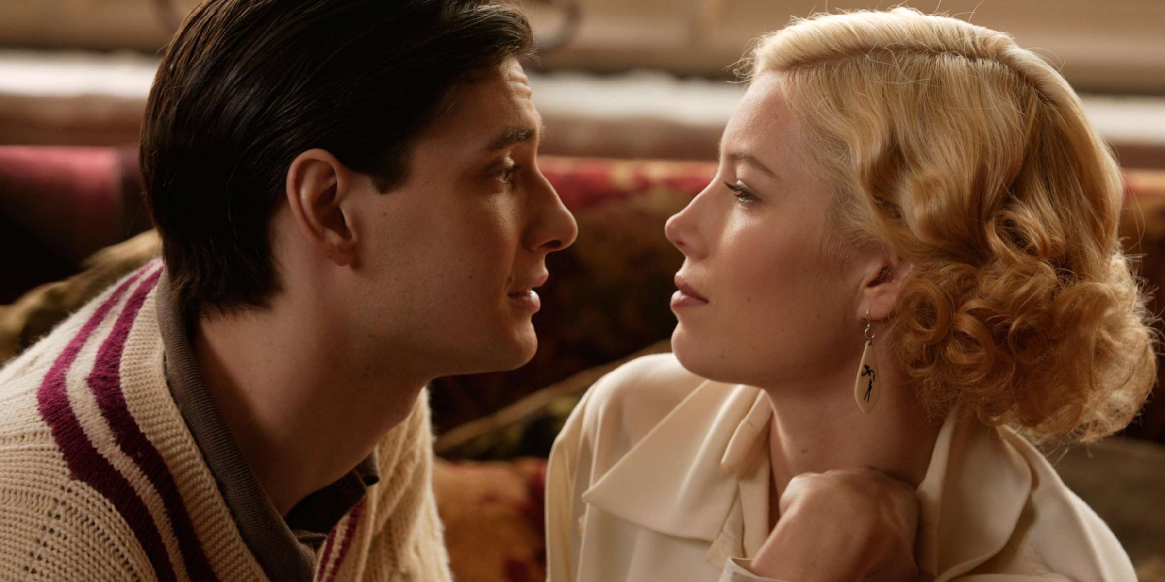 A man gazes lovingly into a blonde woman's eyes in Easy Virtue