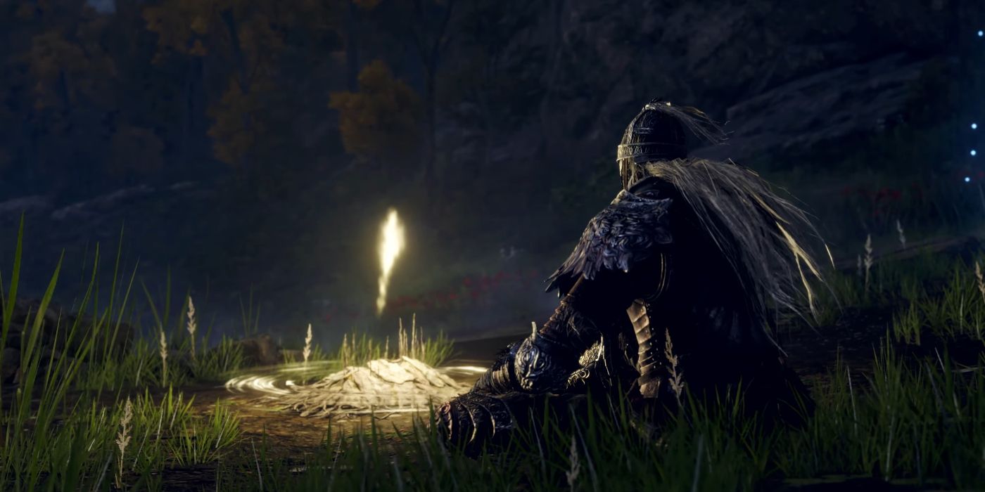 An Elden Ring player sitting at a Site of Grace, which glows gold and illuminates the darkness that would otherwise surround them.