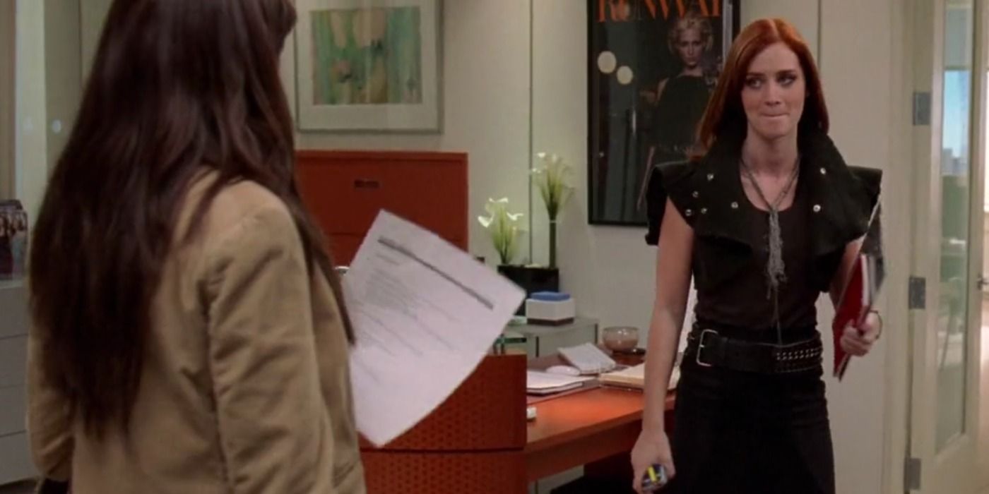 Emily Charlton looks at Andy Sachs in the Runway office in The Devil Wears Prada
