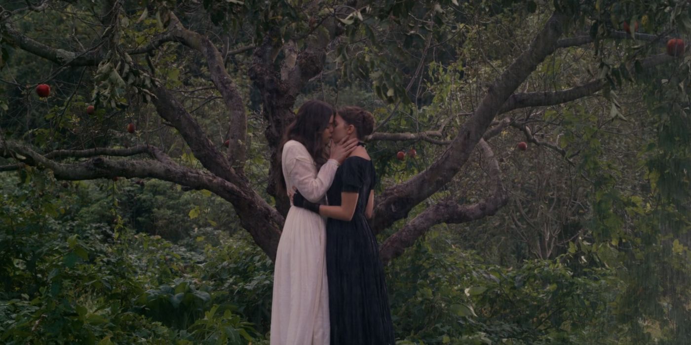 Emily and Sue kissing by a tree on dickinson