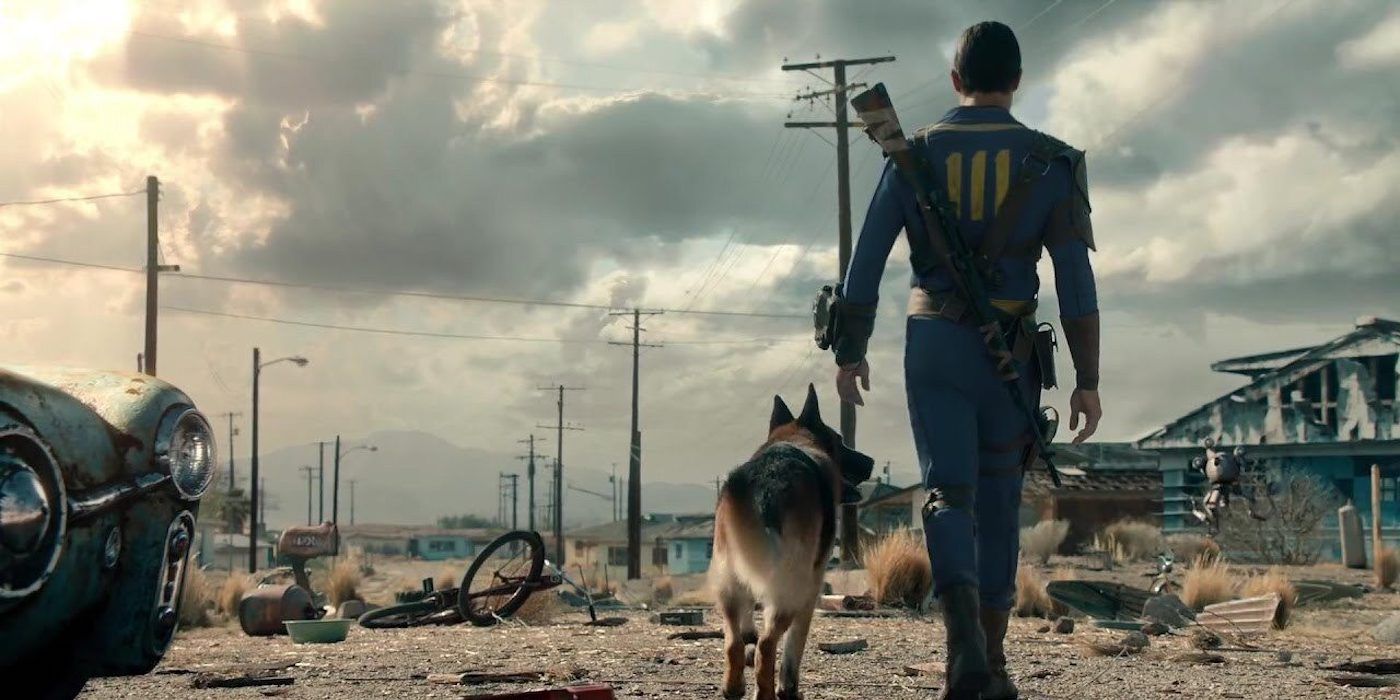 A character and a dog walking through a barren land in Fallout