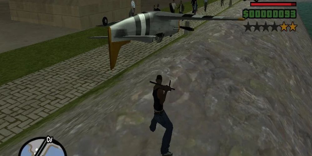 A guy encounters an upside down plane on a street in Grand Theft Auto.