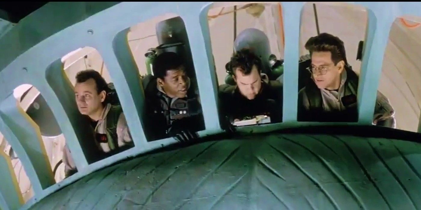 Venkman Winston Ray and Egon look out of Lady Liberty's crown in Ghostbusters II