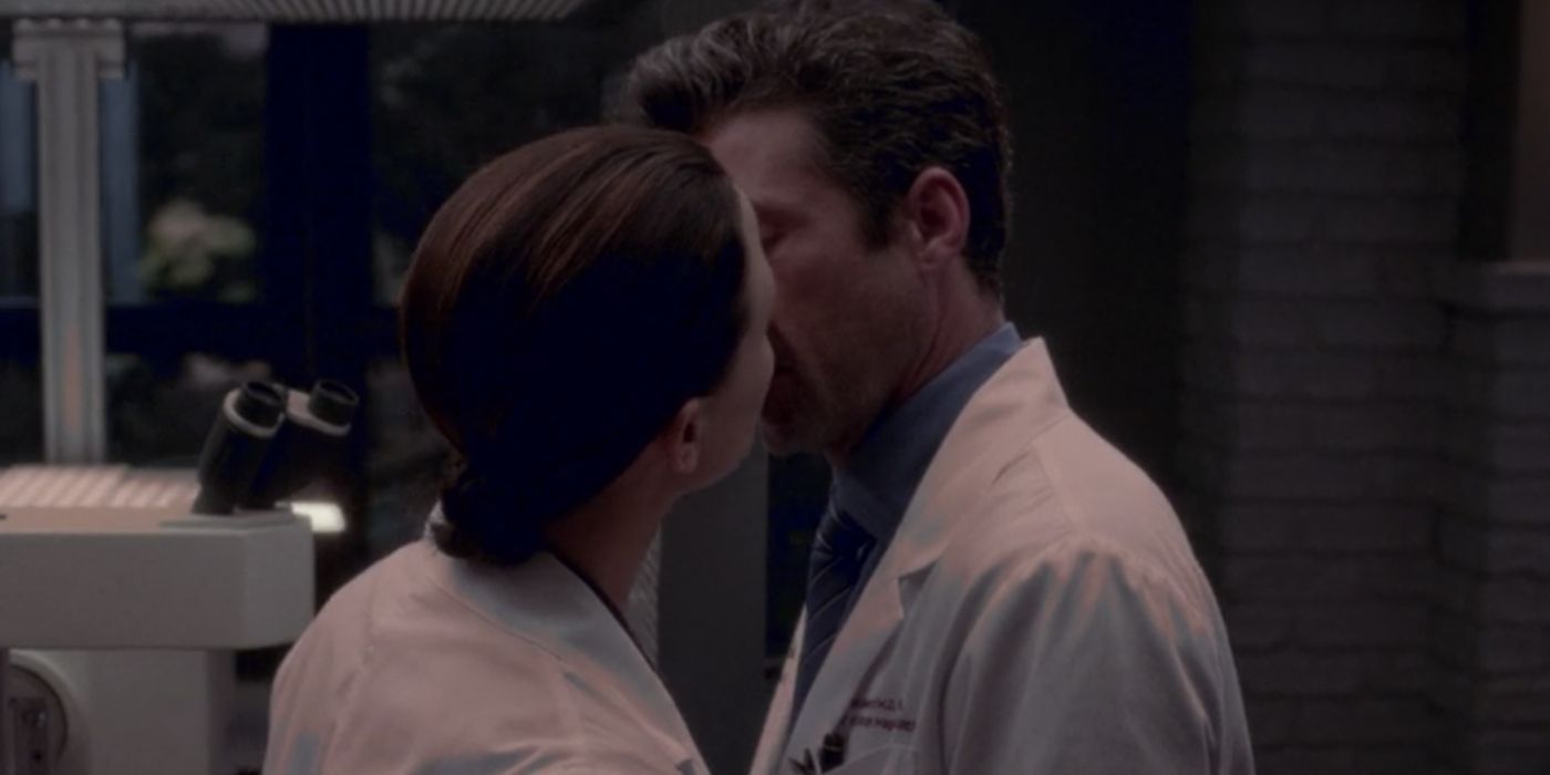 Derek and a DC intern kissing in Grey's Anatomy