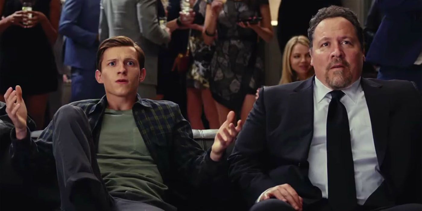 Happy Hogan sitting with Peter Parker in Spider-Man: Homecoming