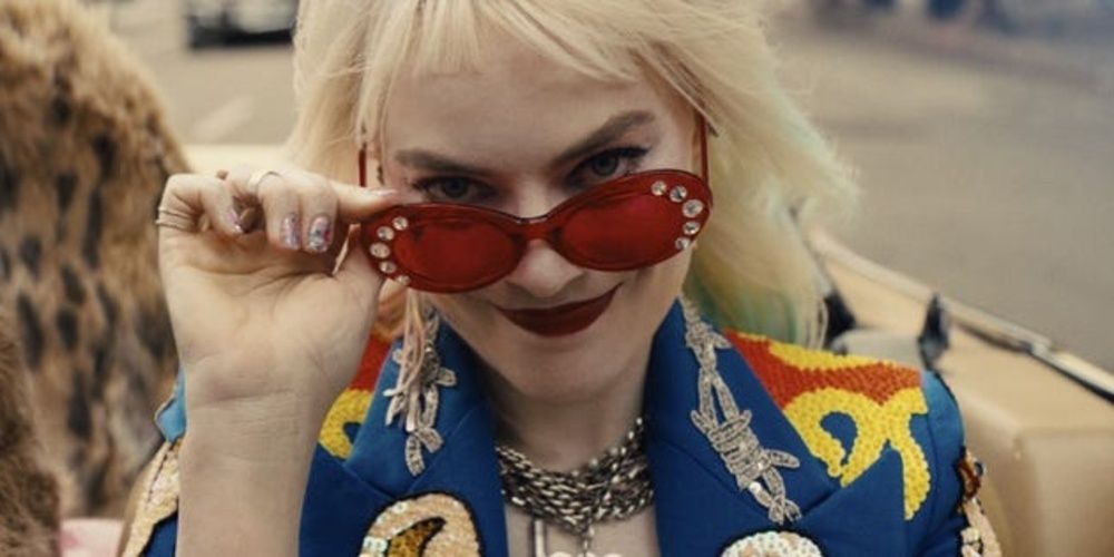 Harley Quinn looking into the camera and smiling in Birds of Prey