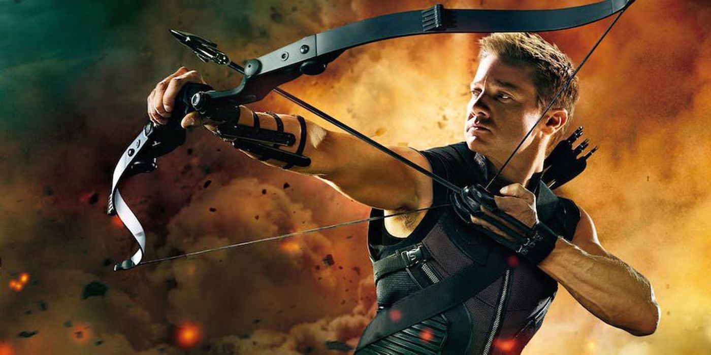 Hawkeye shooting an arrow in front of fire.