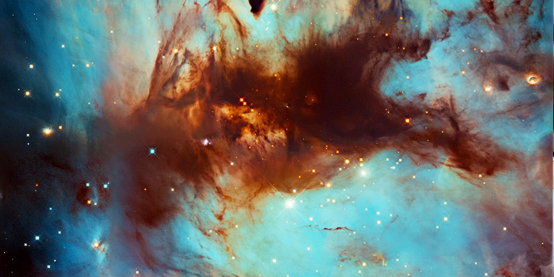 Hubble Spots Swirls Of Dust In The Flame Nebula