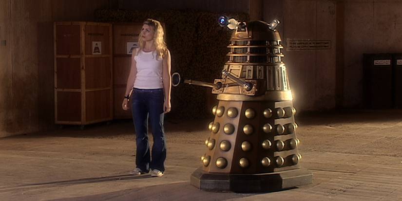 Rose nervously walking alongside a Dalek in the Doctor Who season 1 episode Dalek.