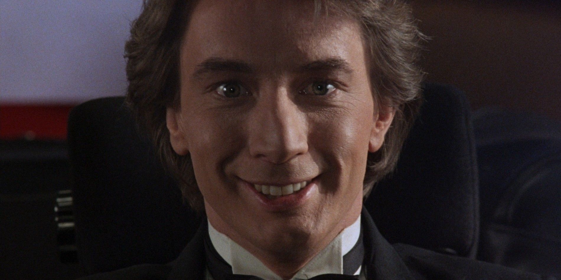 Close up of Martin Short wearing a suit in Innerspace 