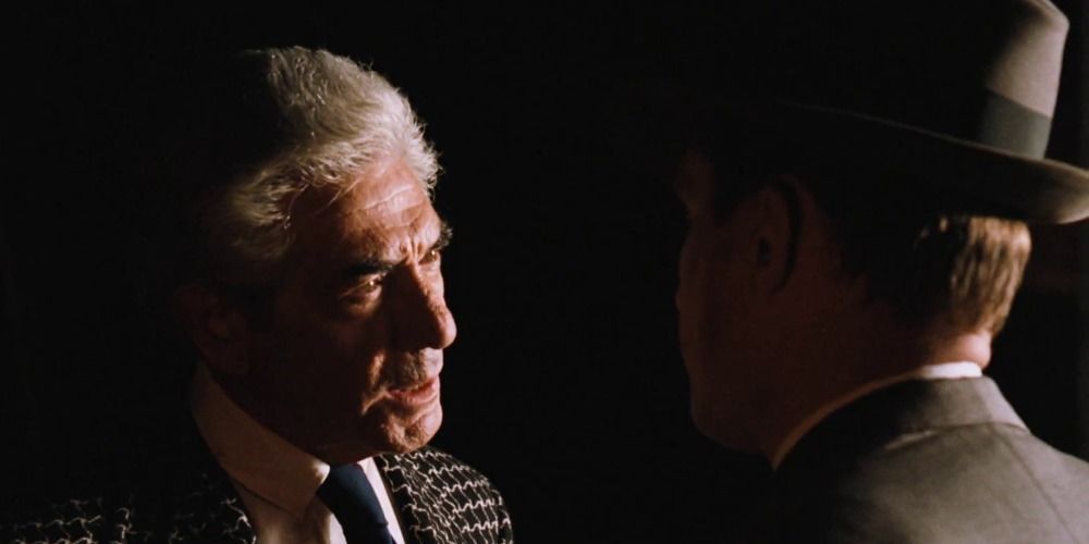 Consigliere Tom Hagen informs Hollywood producer Jack Woltz about Vito's request in The Godfather