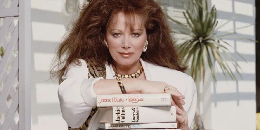 Jackie Collins with her books