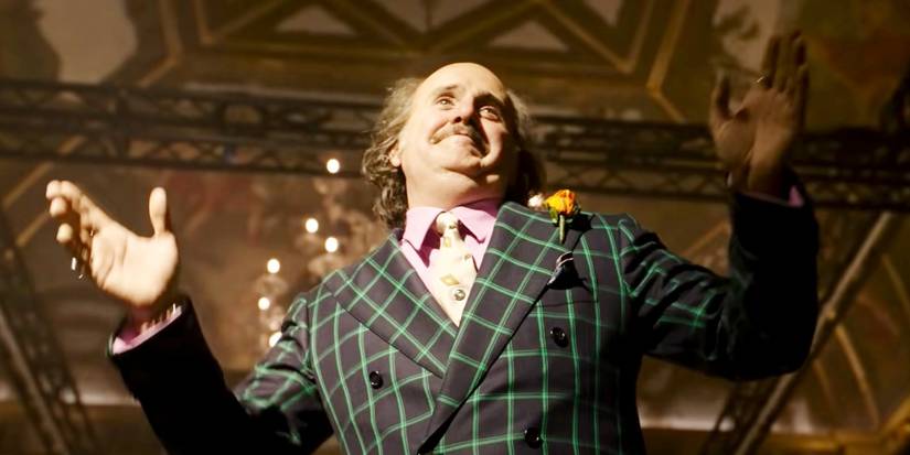 Jared Leto smiling at a party in House of Gucci