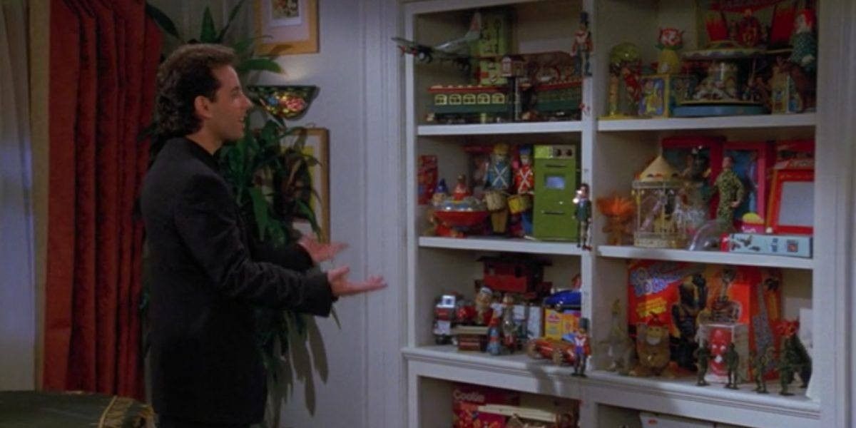 Jerry looks at a shelf of toys in Seinfeld