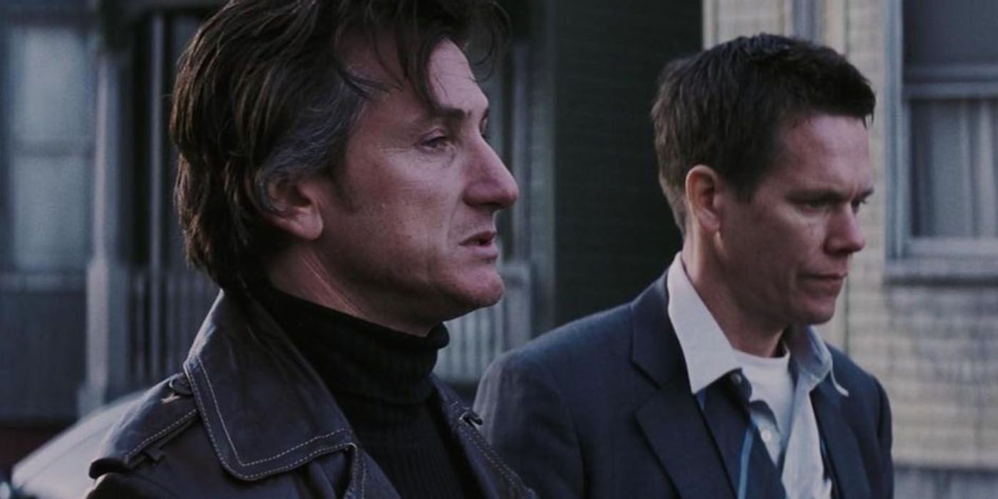 Jimmy and Sean standing together after Dave's murder in Mystic River.