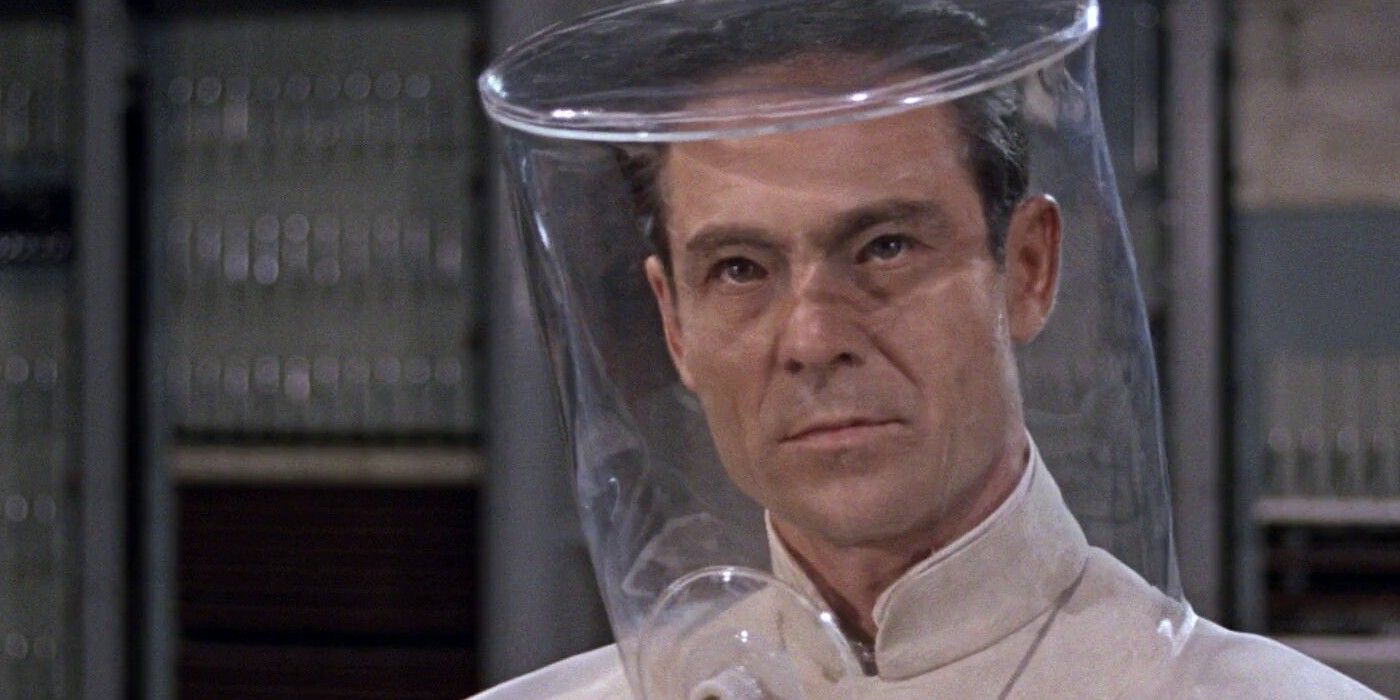 Joseph Wiseman as Dr No wearing a radiation suit