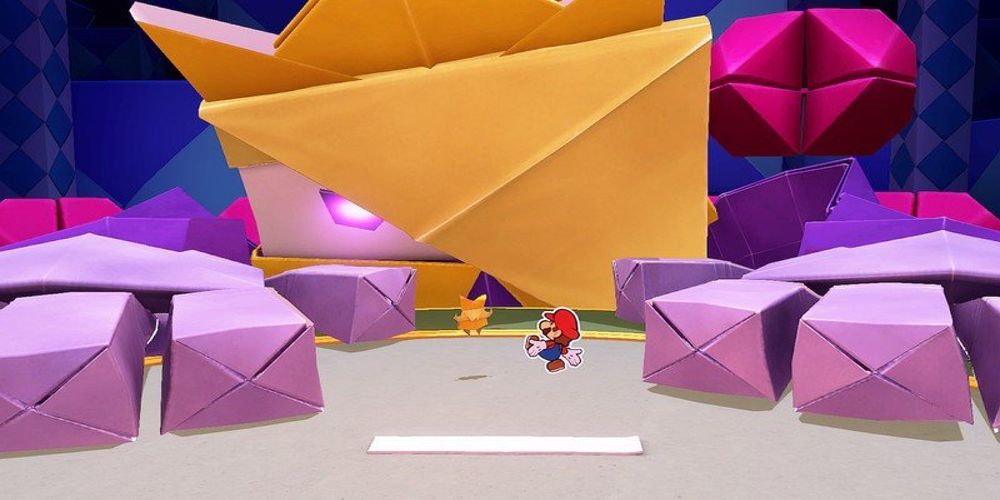 The boss fight against King Olly in Paper Mario: The Origami King on the Nintendo Switch.