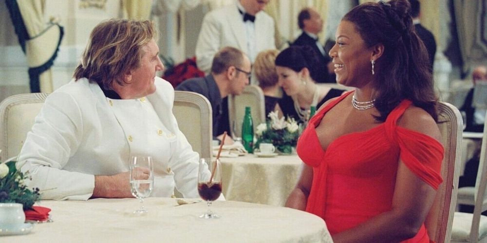 Queen Latifah sits down for a fancy dinner in Last Holiday.