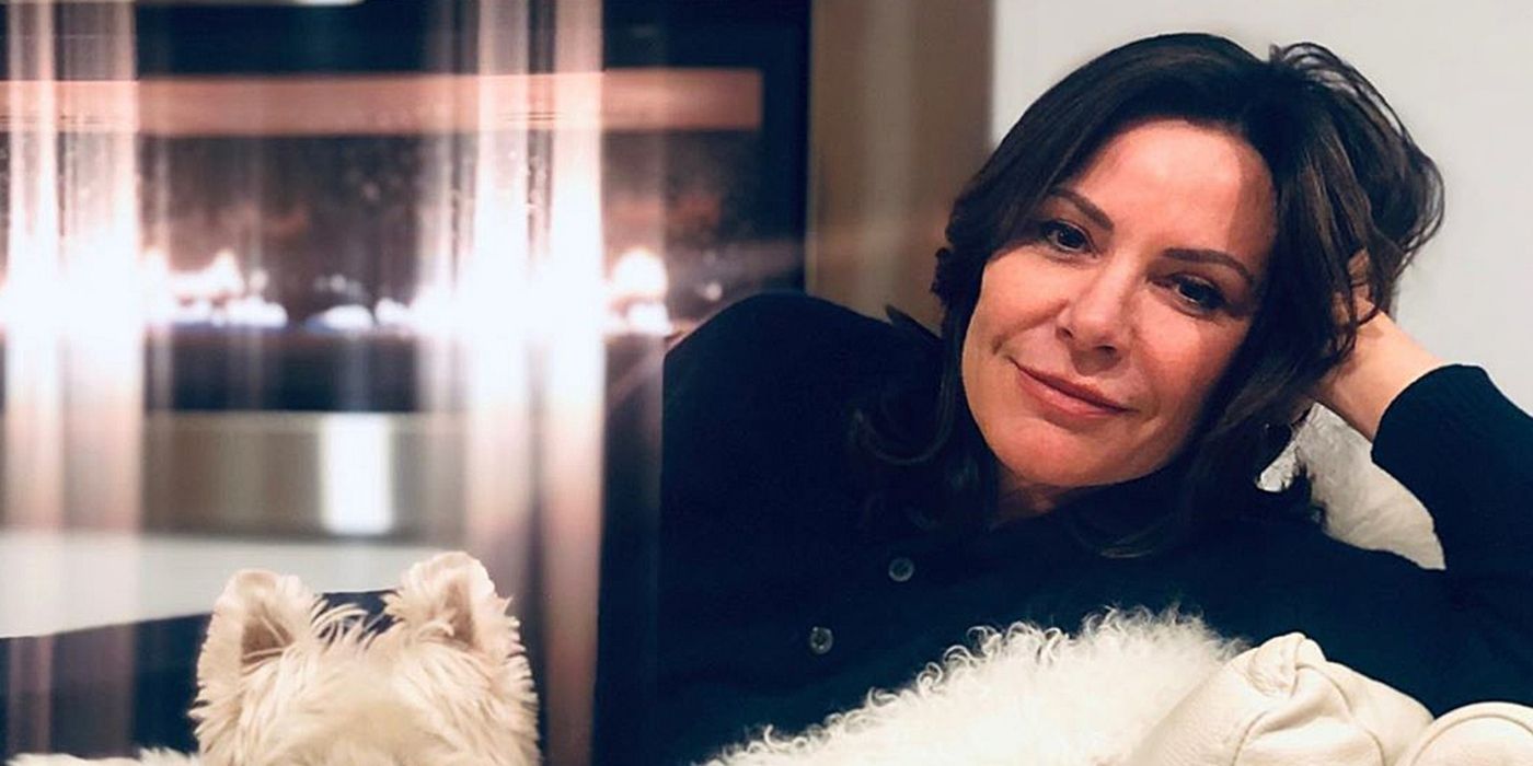 Luann posing with her dog on RHONY