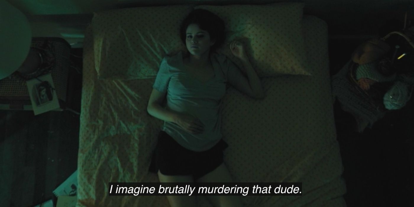 Mabel lying in bed on Only Murders in the Building
