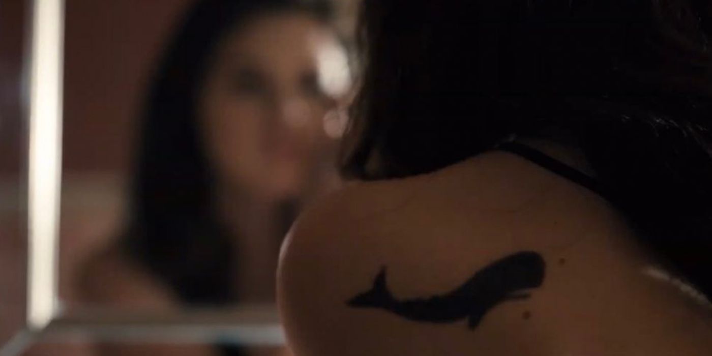 Mable's whale tattoo in a scene from Only Murders in the Building