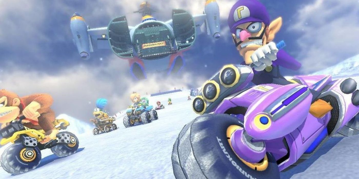 Waluigi mengendarai sepeda di lapangan bersalju saat balapan di Mario Kart 8