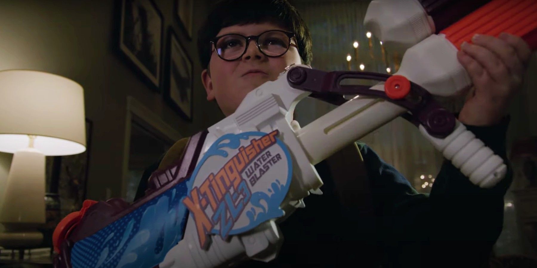 Max with a super soaker in Home Sweet Home Alone