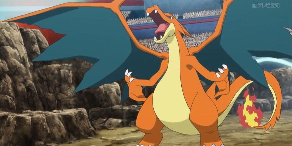 Mega Charizard Y roars and prepares for battle in the Pokemon anime