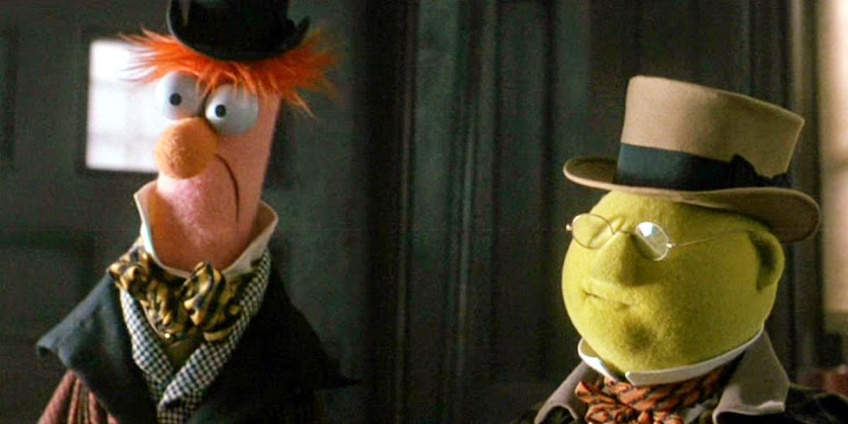 The Charitable Gentlemen look on in The Muppet Christmas Carol.