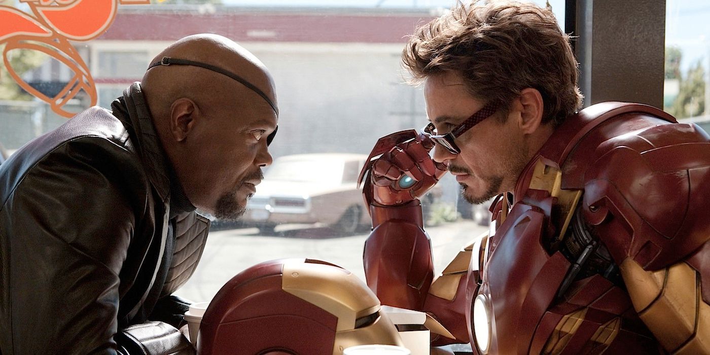Nick Fury and Iron Man talking over donuts in the MCU.