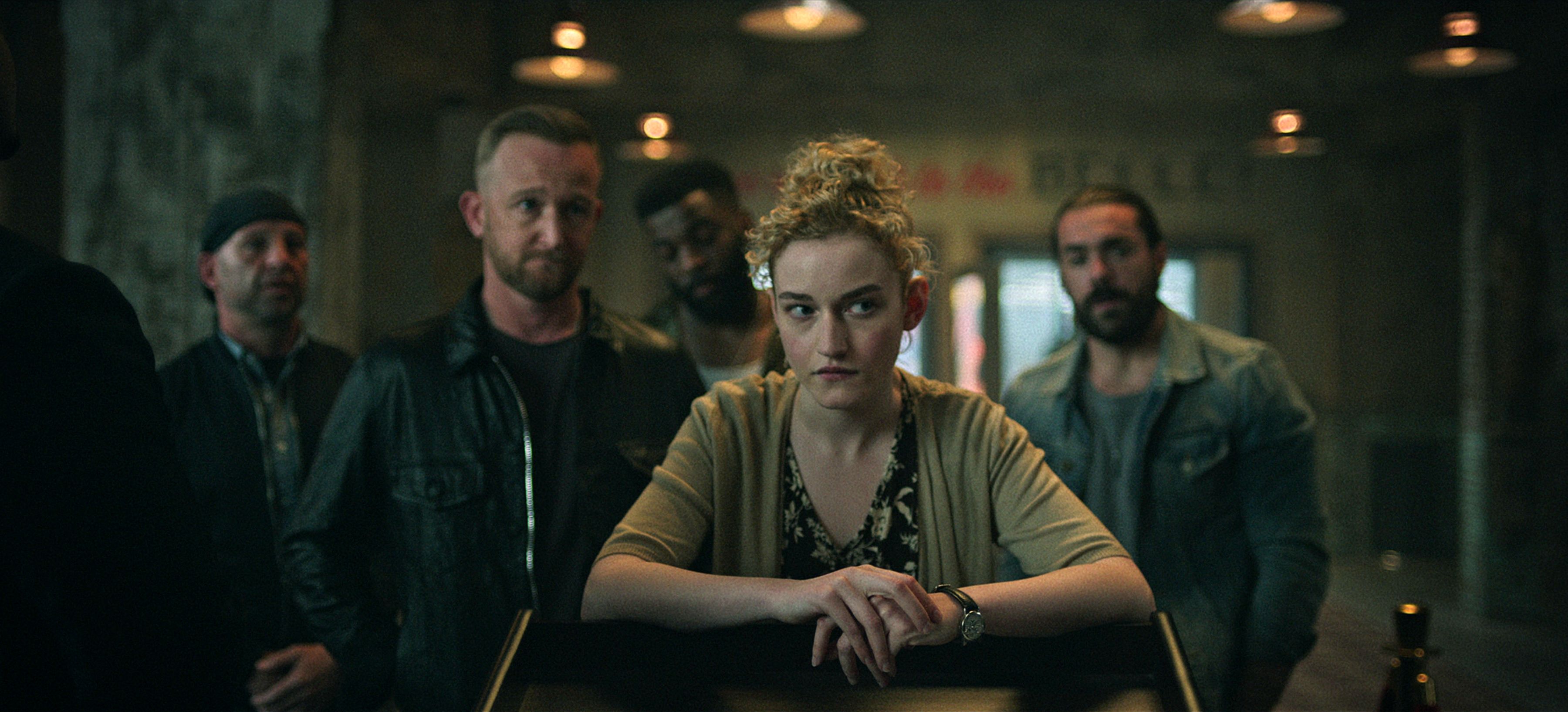 Ozark. (L to R) Eric Ladin as Kerry Stone, Julia Garner as Ruth Langmore in episode 404 of Ozark. Cr. Courtesy of Netflix © 2021