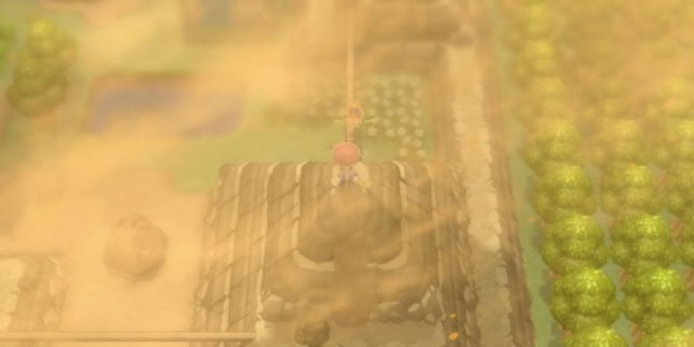 Lucas in Route 228 during a sandstorm in Pokémon BDSP