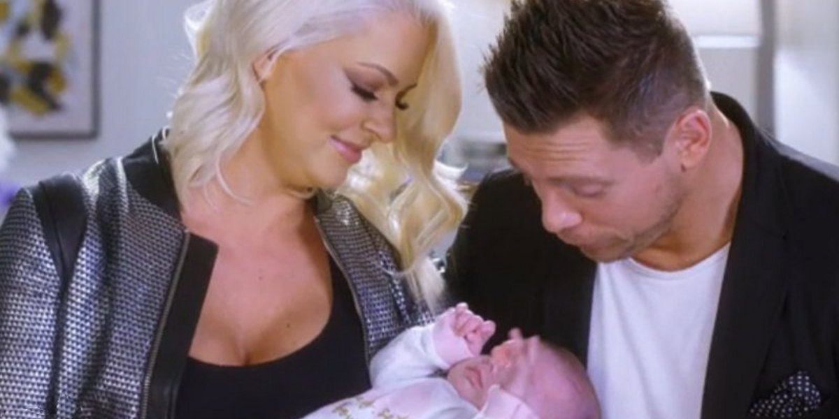 Miz and Maryse look at their baby