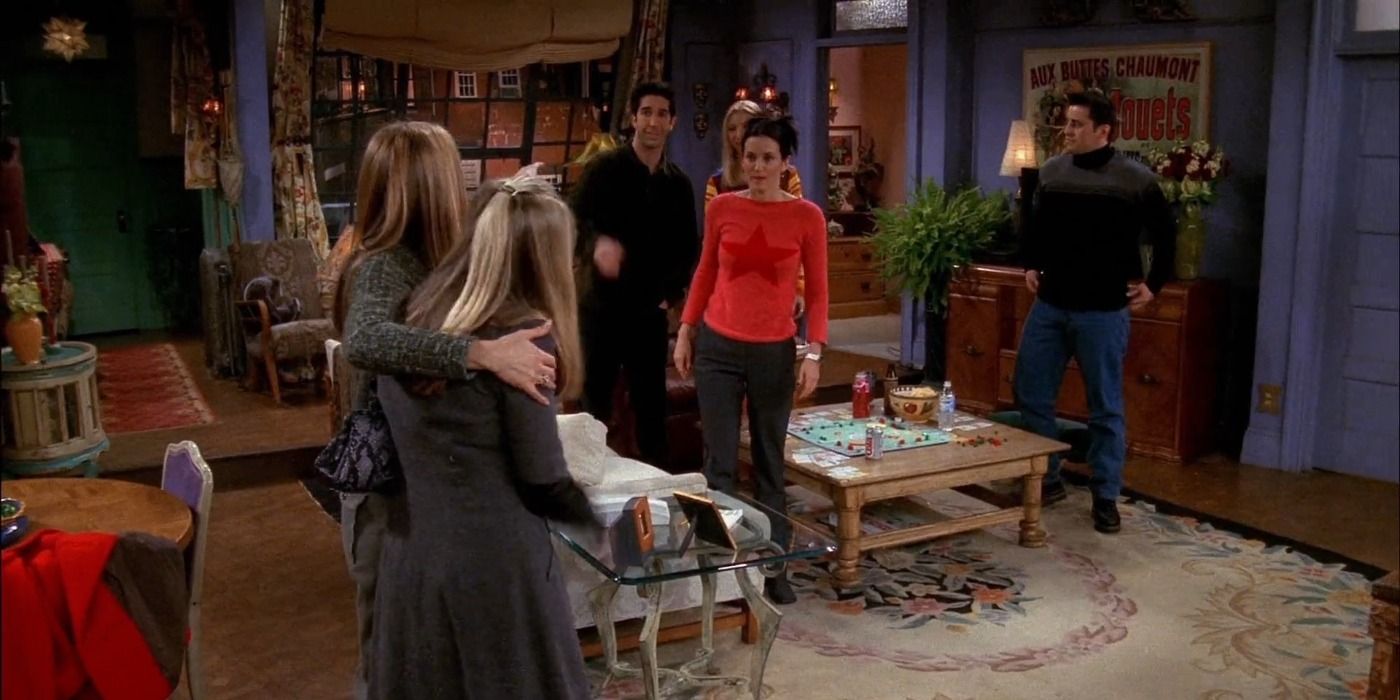 Rachel holds Jill as everybody at Monica's greets them in Friends