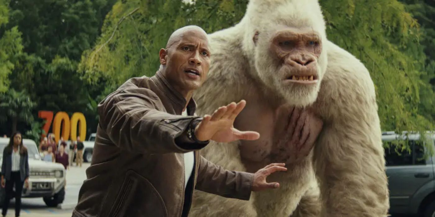 Davis tries to calm down a giant ape in Rampage.
