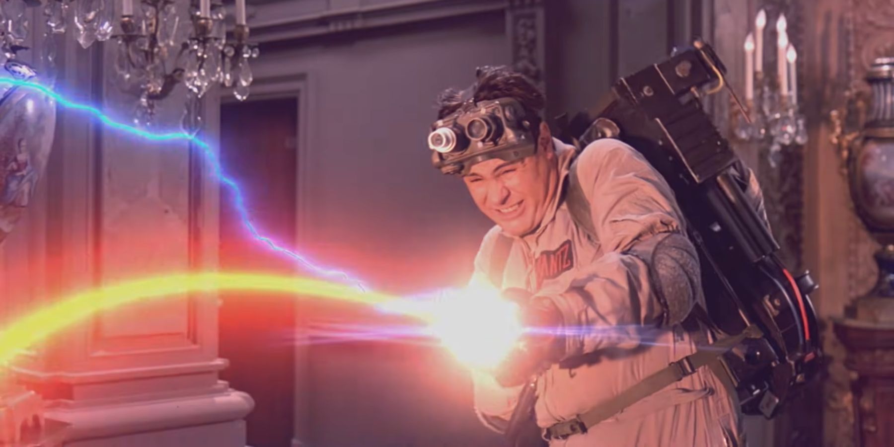 Ray Stantz firing a proton stream at Slimer in Ghostbusters 1984