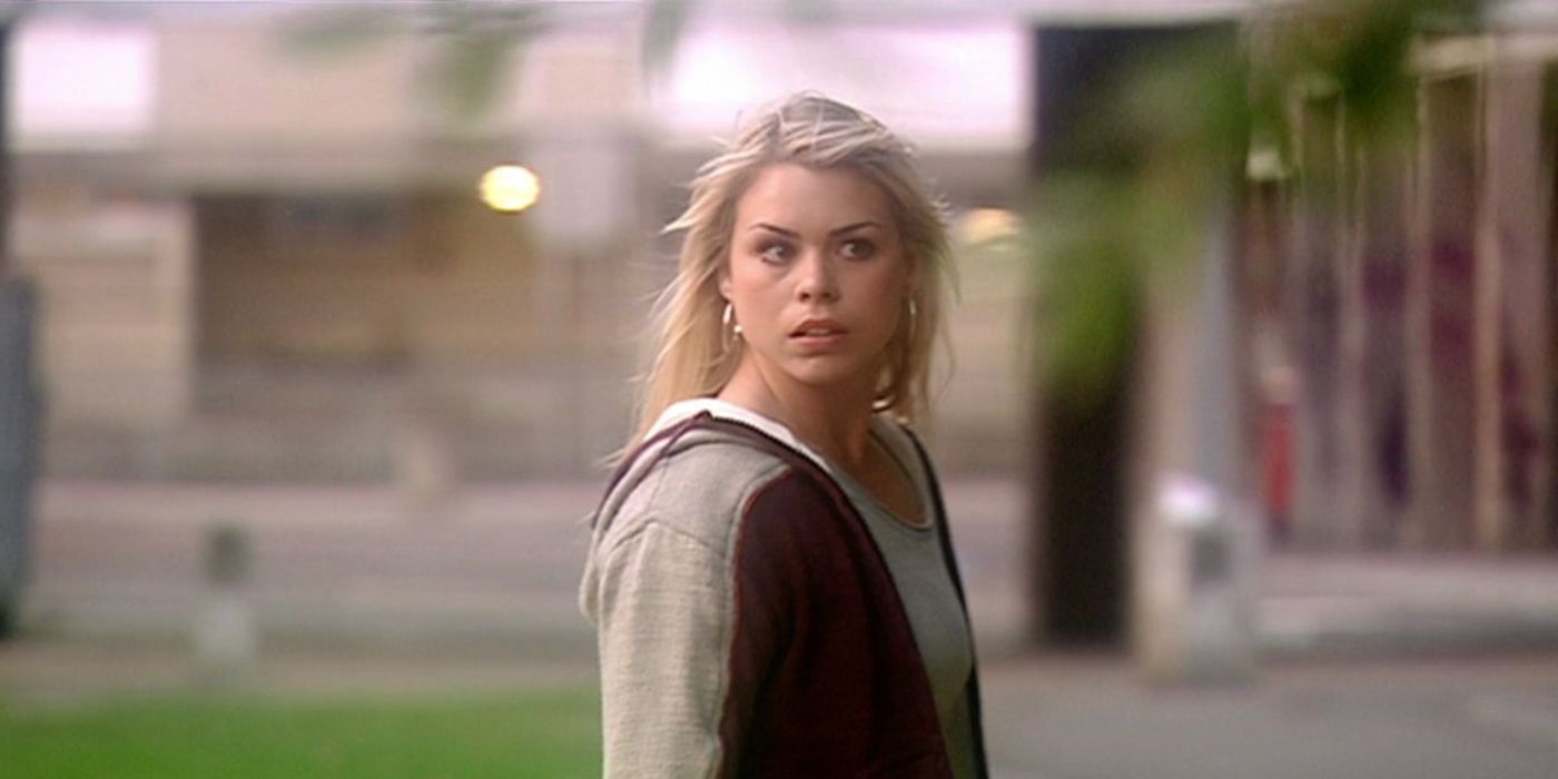 Rose Tyler looks sideways in her debut episode of Doctor Who in 2005