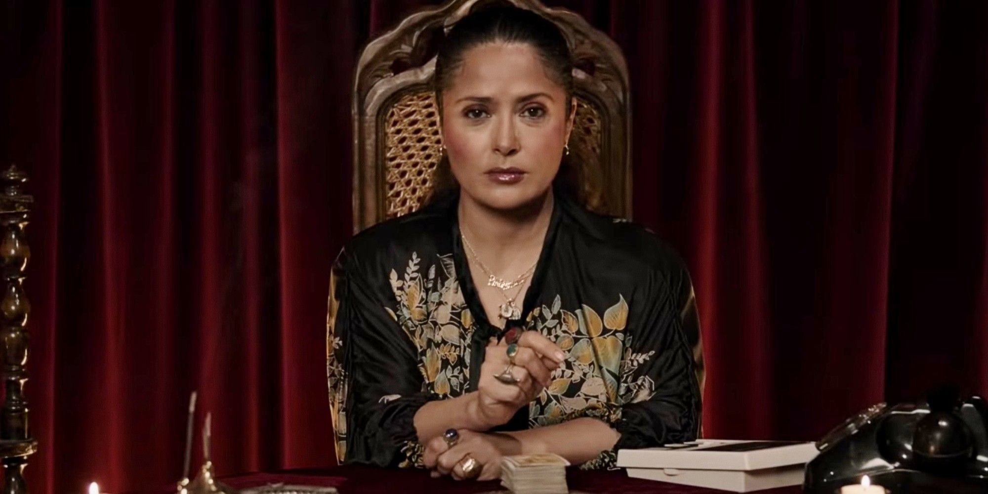 Salma Hayek as a television psychic in the House of Gucci