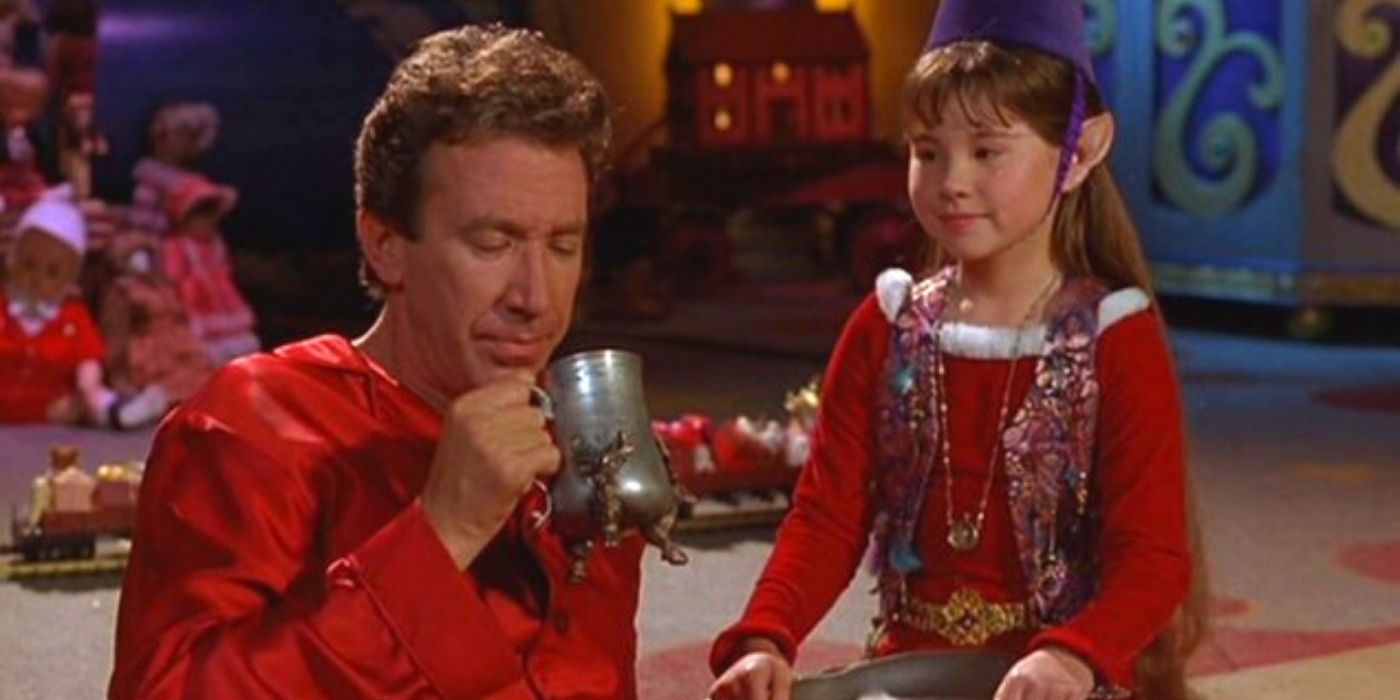 Scott drinking hot cocoa with an elf in The Santa Clause
