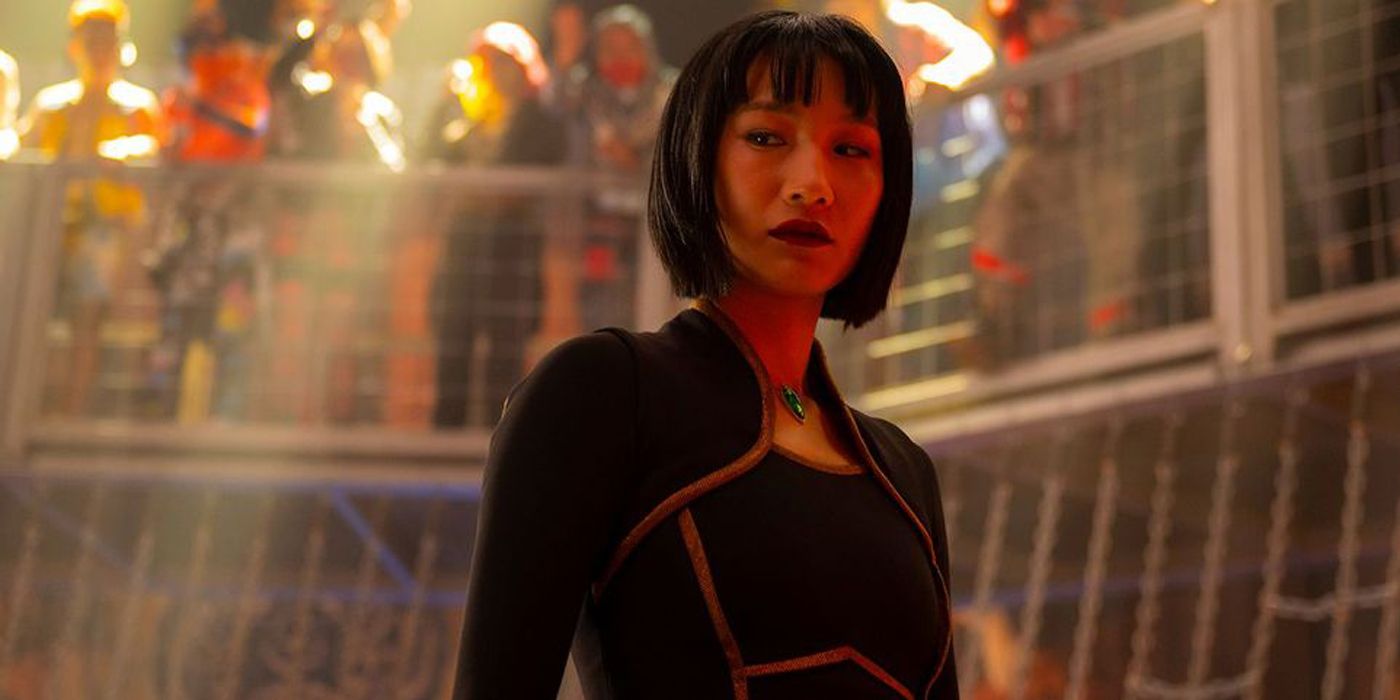 Shang-Chi's sister running the underground fight club.