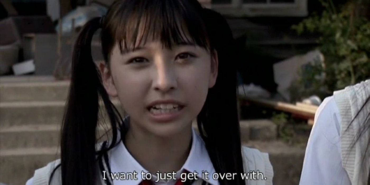 A japanese girls talks to the camera in the movie Shirome